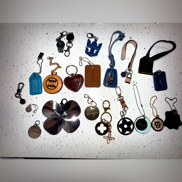 Lot of different items keychain wallet chains miscellaneous